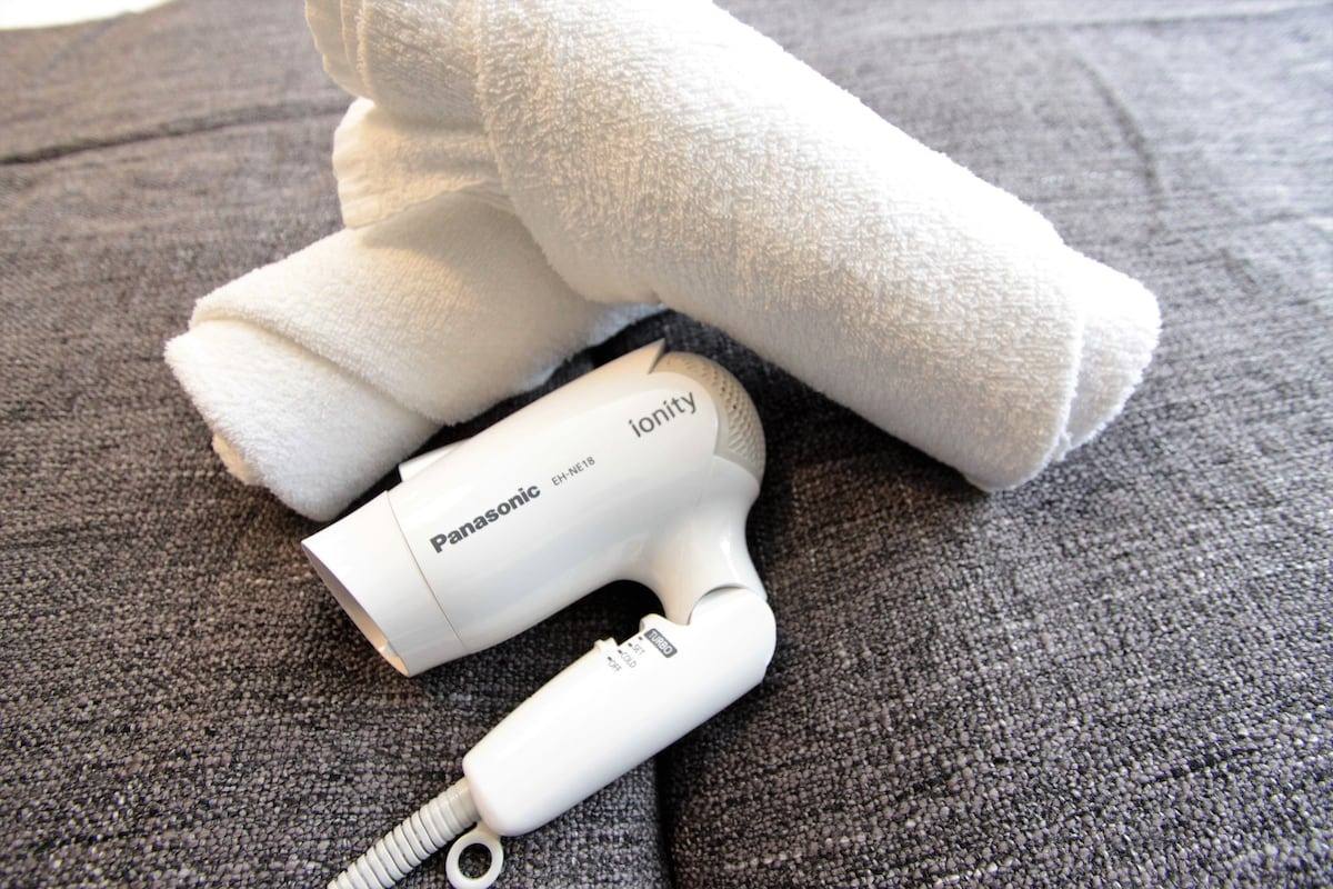 Towel and hair dryer